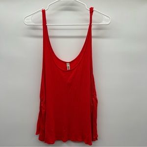 Free People orange open sides tank top ladies size M.